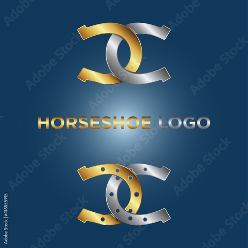 Gold and silver horseshoe logo