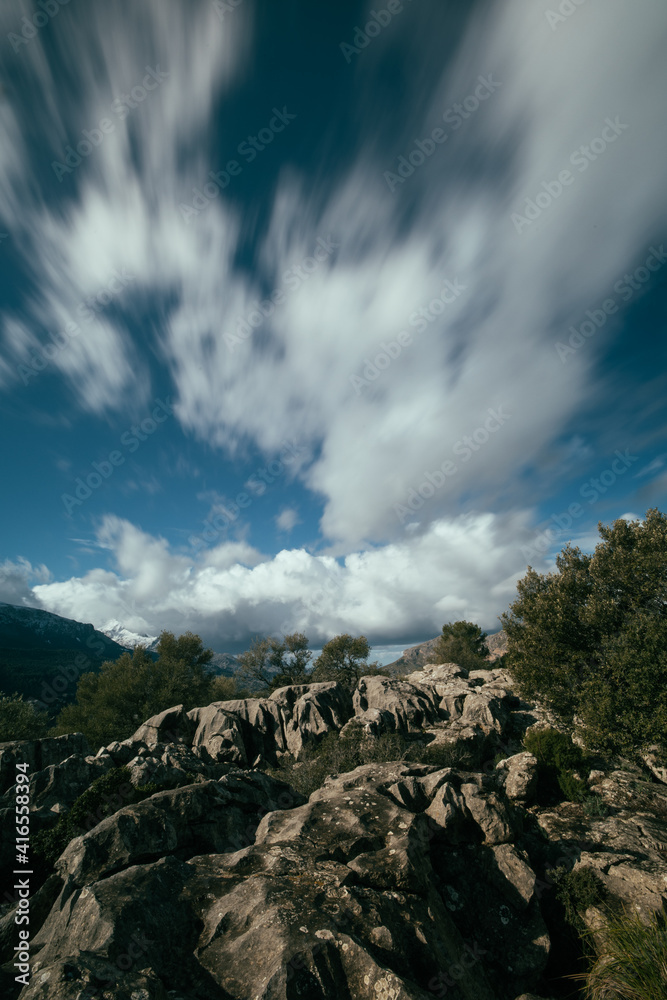 Long exposure of a rocky landscape cloud day