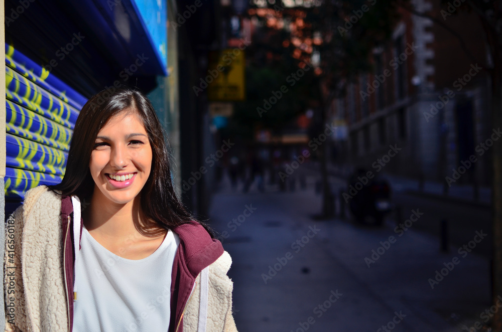 Pretty Woman with radiant smile in the city Pretty Woman with radiant smile in the city