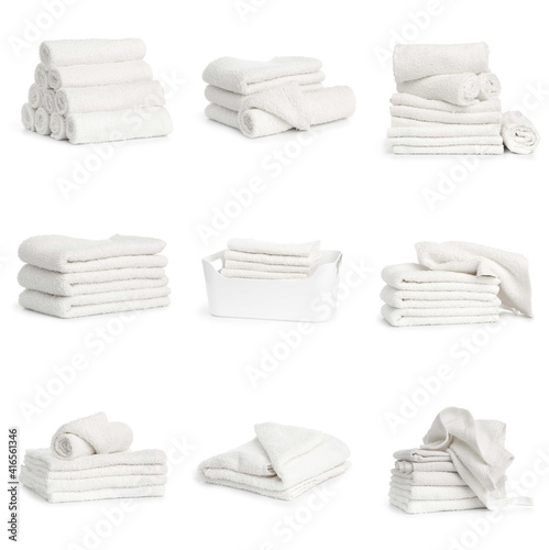 set of white beach towels isolated on white background