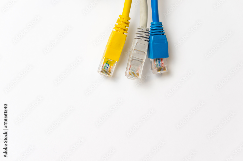 LAN wires cat5 cat6 of different colors on a white background. Internet connection at home for work from home. Choosing an Internet Service Provider. Internet technologies of the future. LAN wires cat5 cat6 of different colors on a white background. Internet connection at home for work from home. Choosing an Internet Service Provider. Internet technologies of the future.