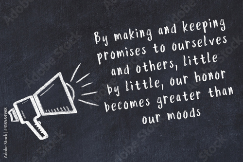 Canvas-taulu Chalk loudspeaker and wise quote on black desk