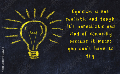 Chalk drawing of a bulb and inscription of wise quote