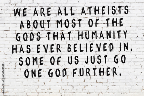 Canvas Print Painted black mindful inscription on white brick wall background