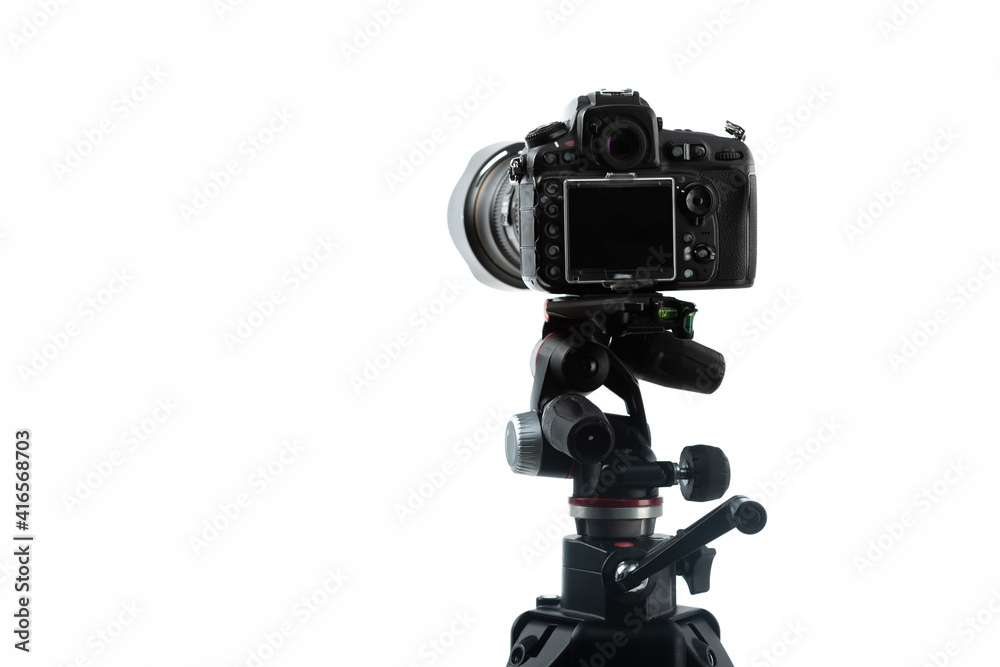 professional digital camera on tripod isolated on white