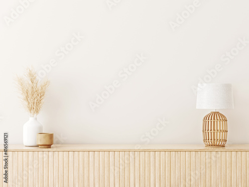 Interior wall mockup in minimalist Japandi style with light biege wooden console, dried pampas grass and wicker basket lamp on empty warm white background. Close up view, 3d rendering, 3d illustration photo