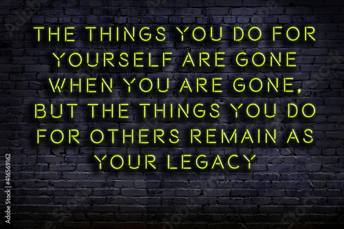 Fotografija Wise quote. Neon inscription against brick wall