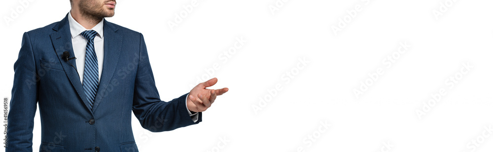 cropped view of anchorman with microphone on blazer pointing with hand isolated on white, banner cropped view of anchorman with microphone on blazer pointing with hand isolated on white, banner