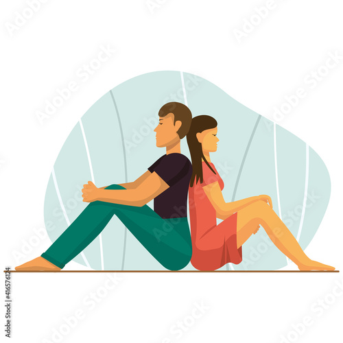 girl and boy back to back sit on the floor  offended love couple