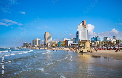 Tel Aviv beach with a view of Mediterranean sea and sea front hotels, Israel.