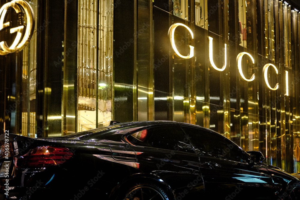 Bangkok, Thailand - April 04, 2018: a luxurious and expensive sports car is  parked outside of the gucci store in the centre of the Thai capital Bangkok  Stock Photo | Adobe Stock