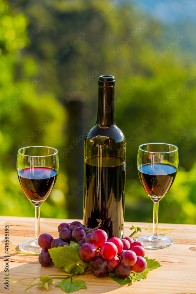 wine bottle and grapes