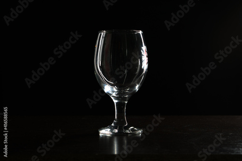 empty beer glass on black background