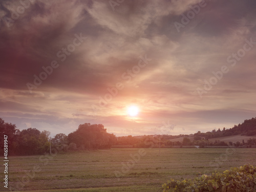 landscape view at sunset. Field Against Sky At Sunset