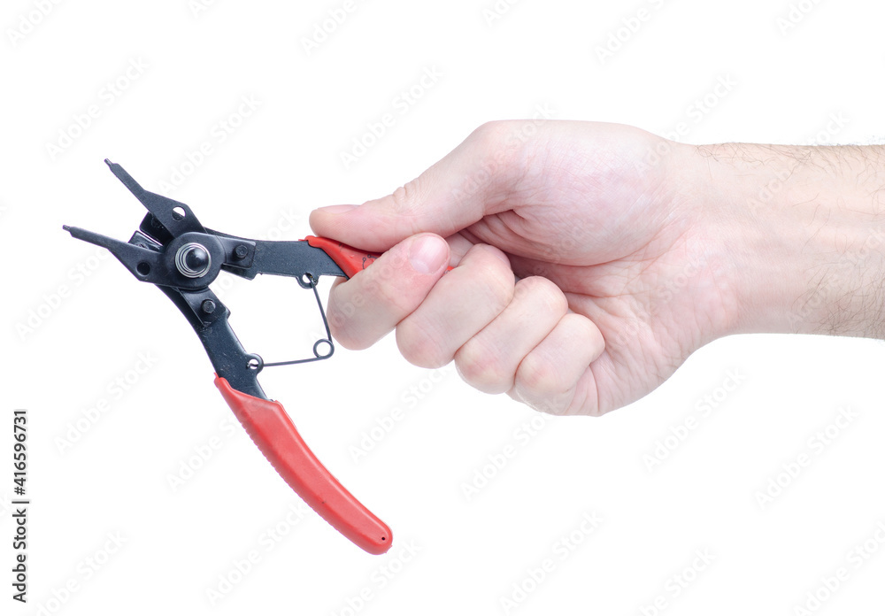 Circlip pliers tool in hand on white background isolation Circlip pliers tool in hand on white background isolation
