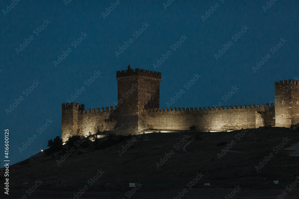 Photos of the Crimean peninsula, Sudak fortress, also called Genoese rock in the evening time Photos of the Crimean peninsula, Sudak fortress, also called Genoese rock in the evening time