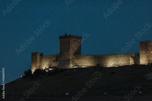 Photos of the Crimean peninsula, Sudak fortress, also called Genoese rock in the evening time photo