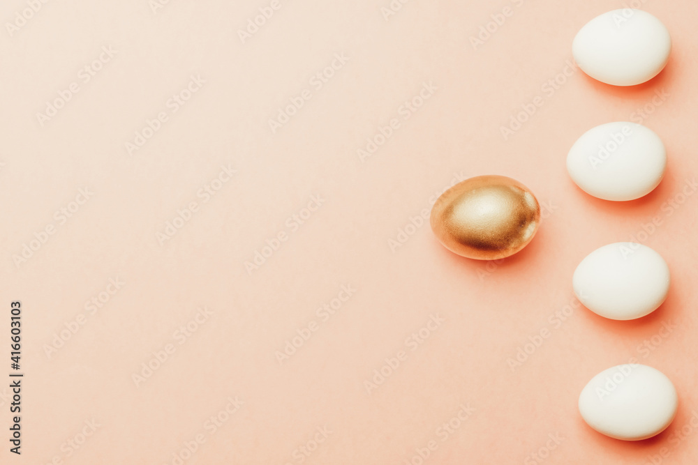 Easter set. Golden, white colour egg on pastel pink background in Happy Easter decoration. Traditional design with copy space. Easter set. Golden, white colour egg on pastel pink background in Happy Easter decoration. Traditional design with copy space.