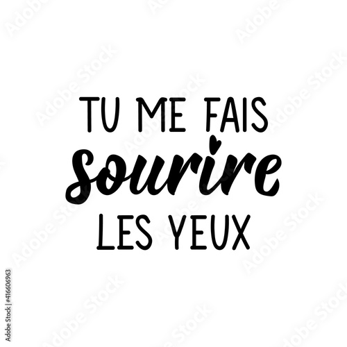 You make my eyes smile - in French language. Lettering. Ink illustration. Modern brush calligraphy.