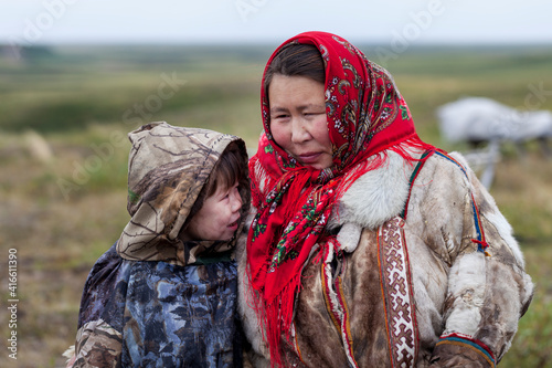 The extreme north, Yamal, the past of Nenets people, the dwelling of the peoples of the north, a family photo near the yurt in the tundra