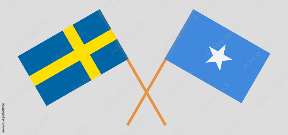 Crossed flags of Sweden and Somalia. Official colors. Correct proportion