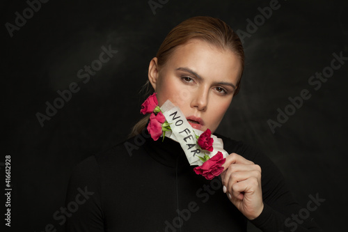 фотографія Rebel woman rips the gag off her mouth