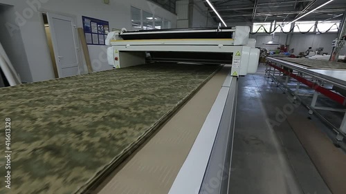 Sewing production. Fabric cutting shop. photo