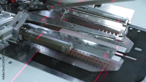 Sewing production. Machine for stitching on fabric.