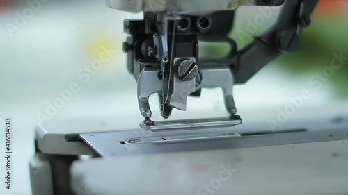 Sewing production. Machine for stitching on fabric.