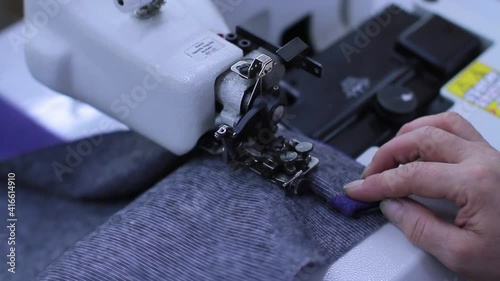 Sewing production. Machine for stitching on fabric.