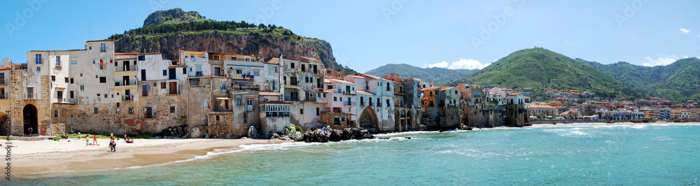 panoramic view of the historic town of Cefalu on Sicilia from the seaside, Italy