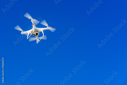 drone flight in the blue sky © Leszek