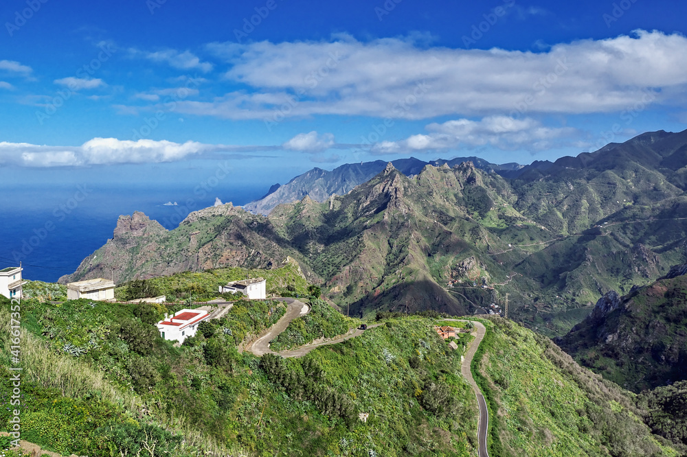 Obraz premium View over the Anaga mountains and the Atlantic from Taborno (Tenerife Island) Great view over the Anaga mountains on Tenerife, from the Mirador del Fuente in Taborno. Above that blue sky with small wh