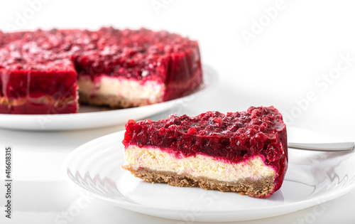 Homemade cottage cheese cheesecake with lingonberry jelly topping