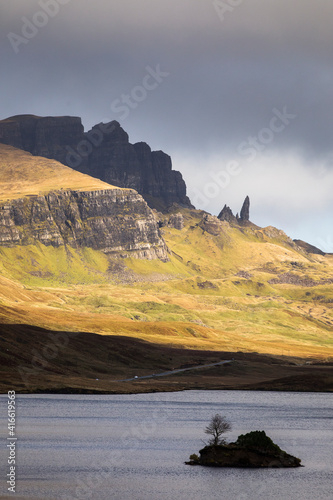 Loch Leathan and Old man of Storr rock formations, Isle of Skye, Scotland. Concept: typical Scottish landscape, tranquility and serenity, particular morphologies.