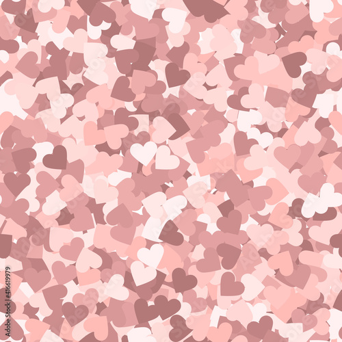 Glitter seamless texture. Actual pink particles. Endless pattern made of sparkling hearts. Popular a
