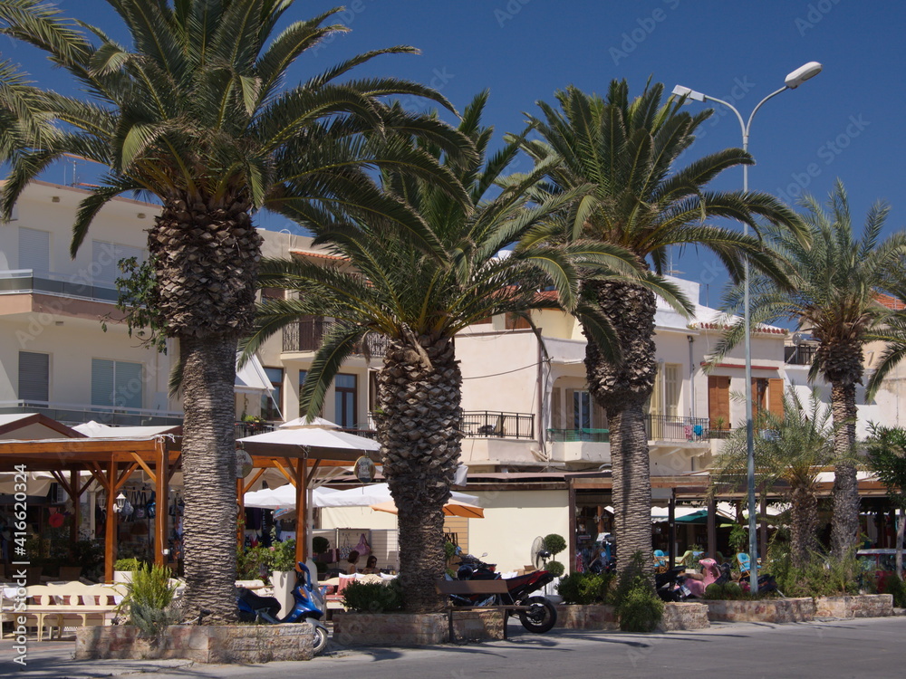 Street with palms in Rethymno on Crete in Greece, Europe
