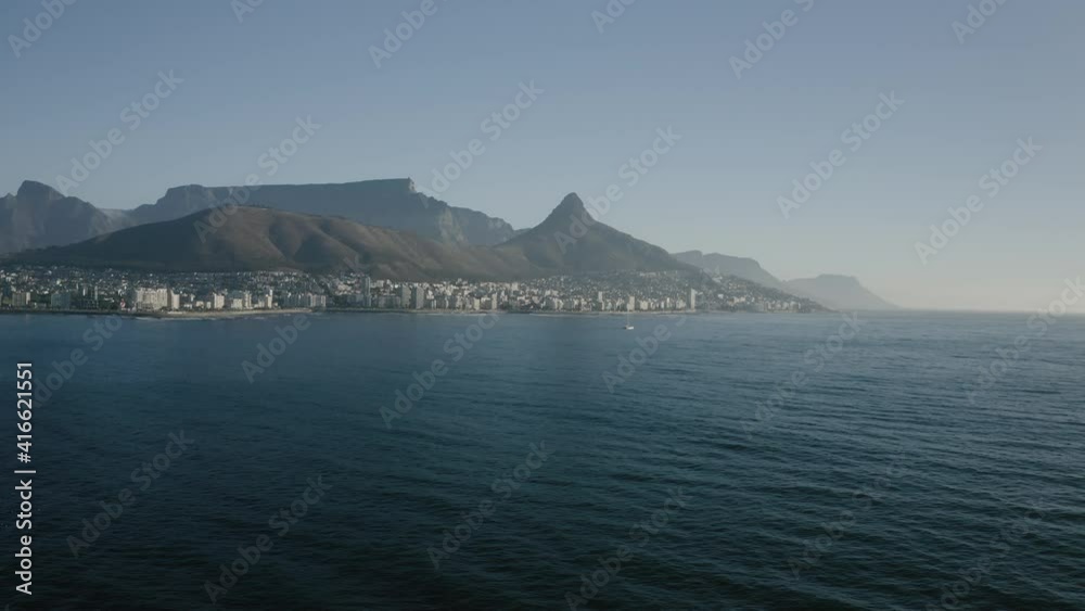 Aerial view of Cape Town, South Africa, with Green Point and Sea Point, Table Mountain, Lion's Head, Signal Hill and Devil's Peak on a bright and sunny day filmed in 4k with a drone Aerial view of Cape Town, South Africa, with Green Point and Sea Point, Table Mountain, Lion's Head, Signal Hill and Devil's Peak on a bright and sunny day filmed in 4k with a drone