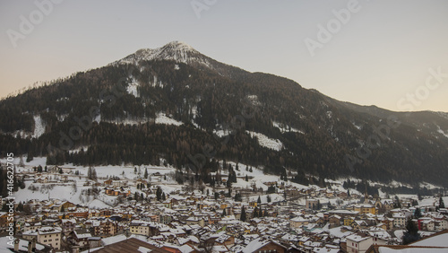 Daily panorama of the city of Moena in italian dolomites in Val di Fassa region during winter time. © Anze