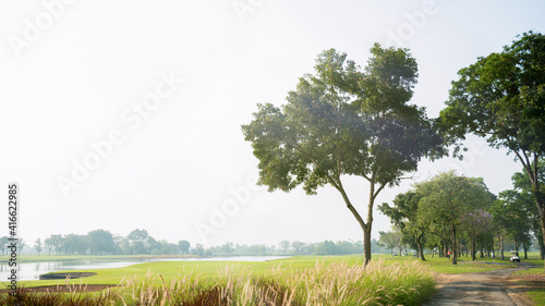 Vast golf course with canal...