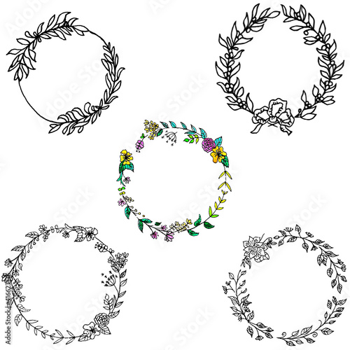 Set of spring wreaths of olive branches with olives, willow branches and various plants. The technique silhouette. Wreaths with various flowers and berries. The color is black.