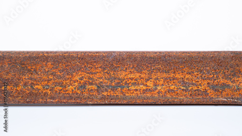 The rusted metal rod is ful...