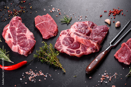Fresh raw beef meat to make delicious juicy steak with spices and herbs