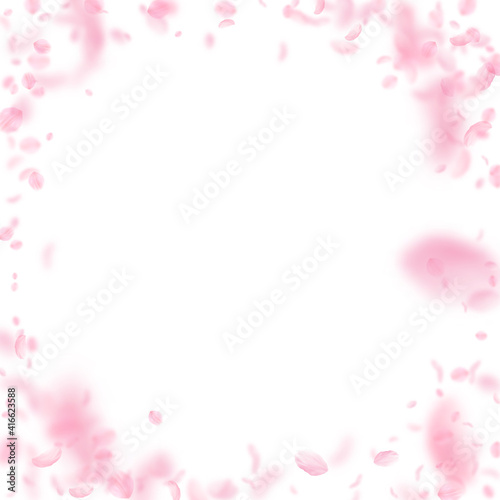 Sakura petals falling down. Romantic pink flowers vignette. Flying petals on white square background © Begin Again