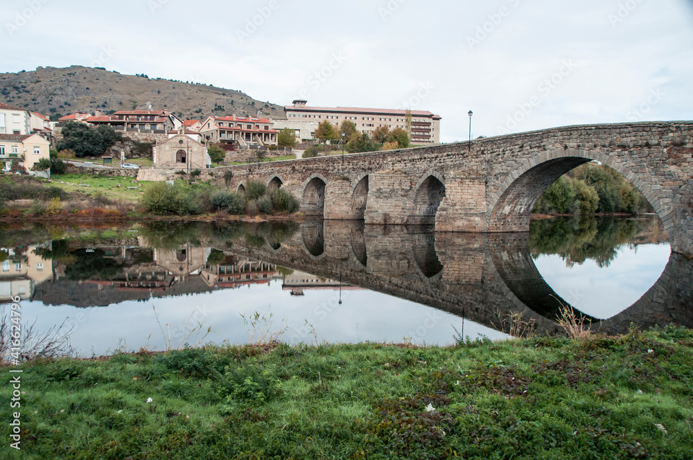 Mesmerizing view of an old bridge over Tormes river in Barco de Avila, Avila, Spain