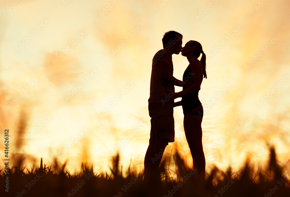 silhouette of man woman kissing silhouette of man woman kissing