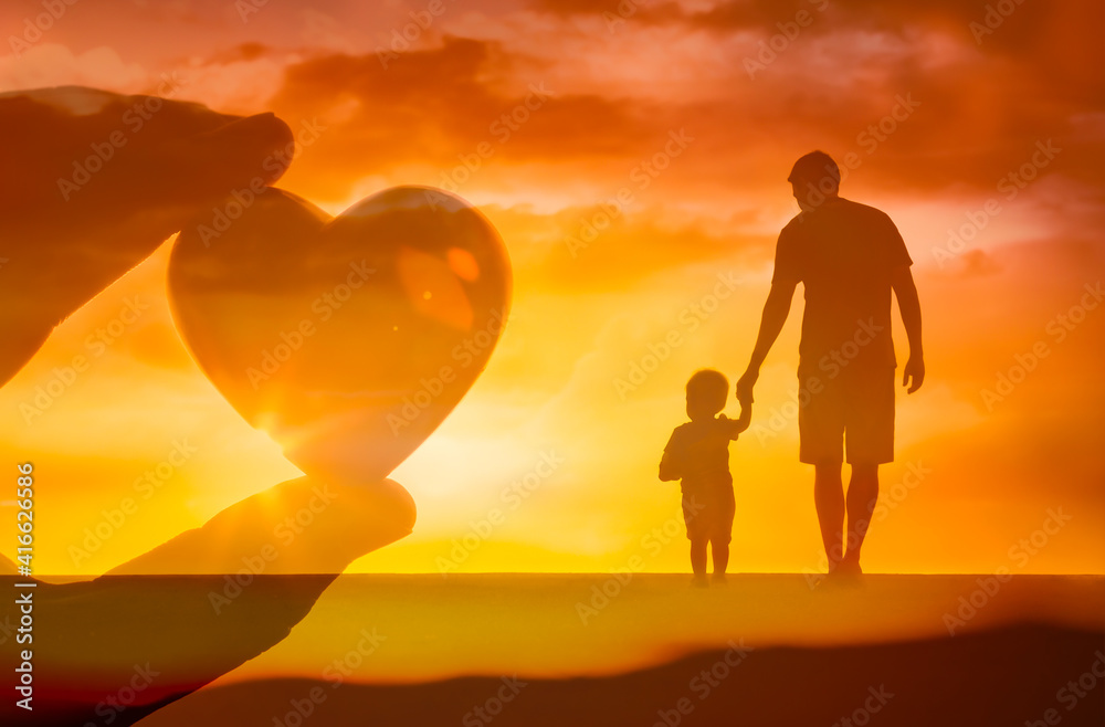 silhouette of father son holding hands. Family, parenting concept. silhouette of father son holding hands. Family, parenting concept.