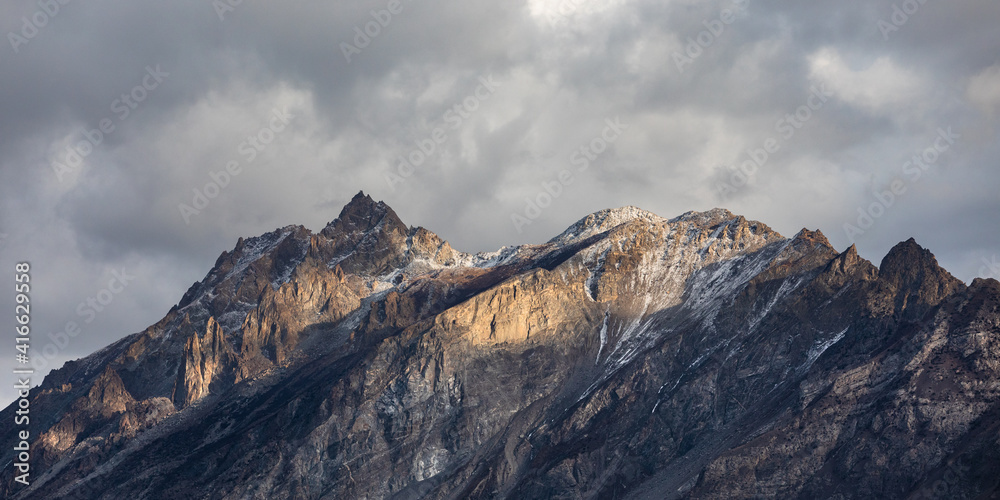 Mountain range cloudy sky panorama. High quality photo