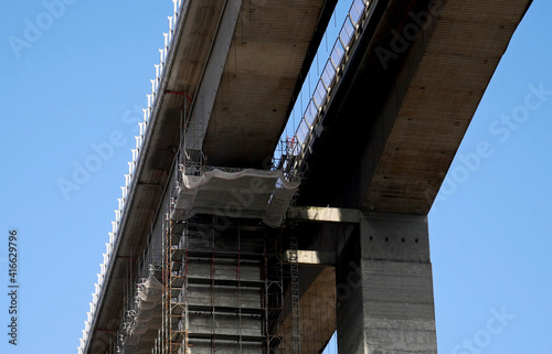 Scaffolding on a reinforced concrete bearing structure of a motorway viaduct