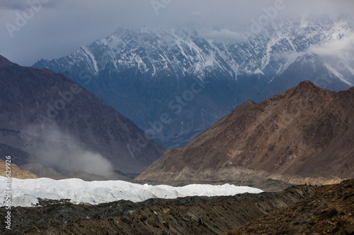 Karakoram mountain range Hoper Glacier on the way to Rush lake . High quality photo photo